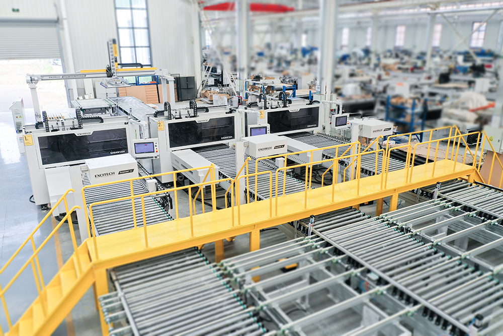 EXCITECH Drilling Cell: solución de perforación automática inteligente. Sin limitaciones de mano de obra, producción en varios turnos, requiere menos operadores que los manuales, aumenta la productividad